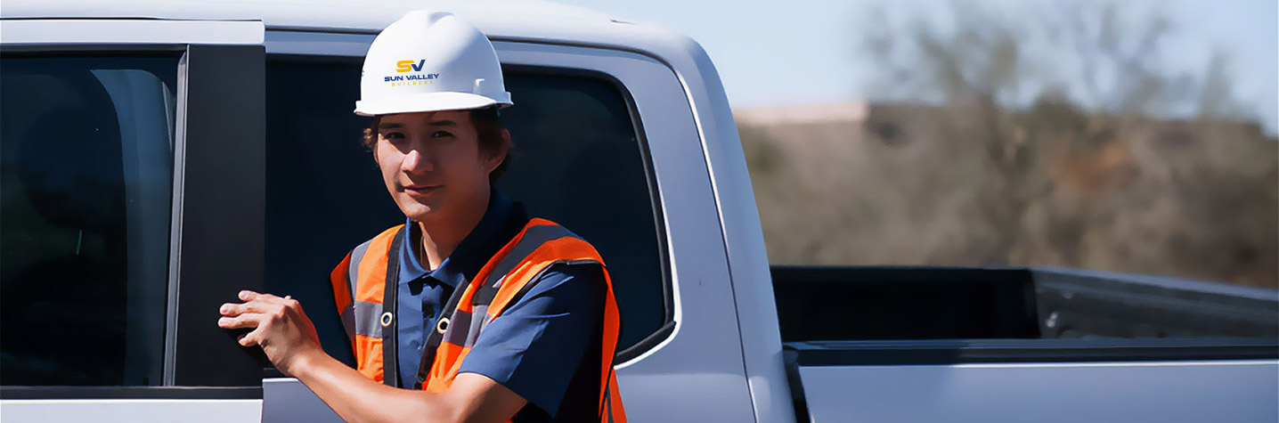 general contractor getting out of a truck