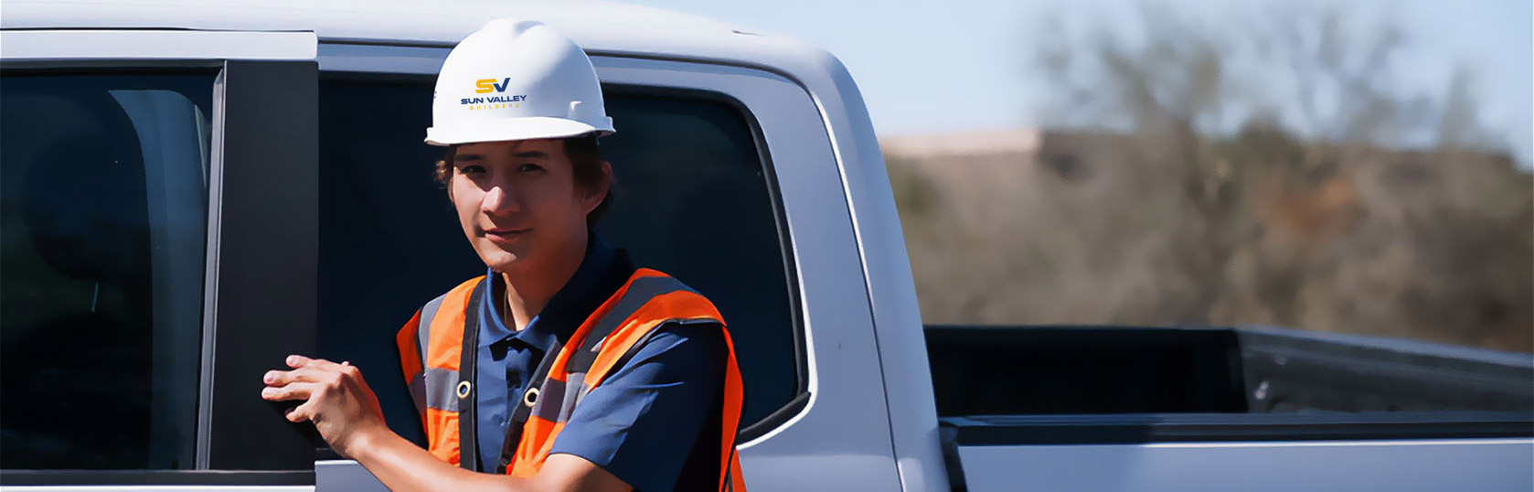 general contractor getting out of a truck